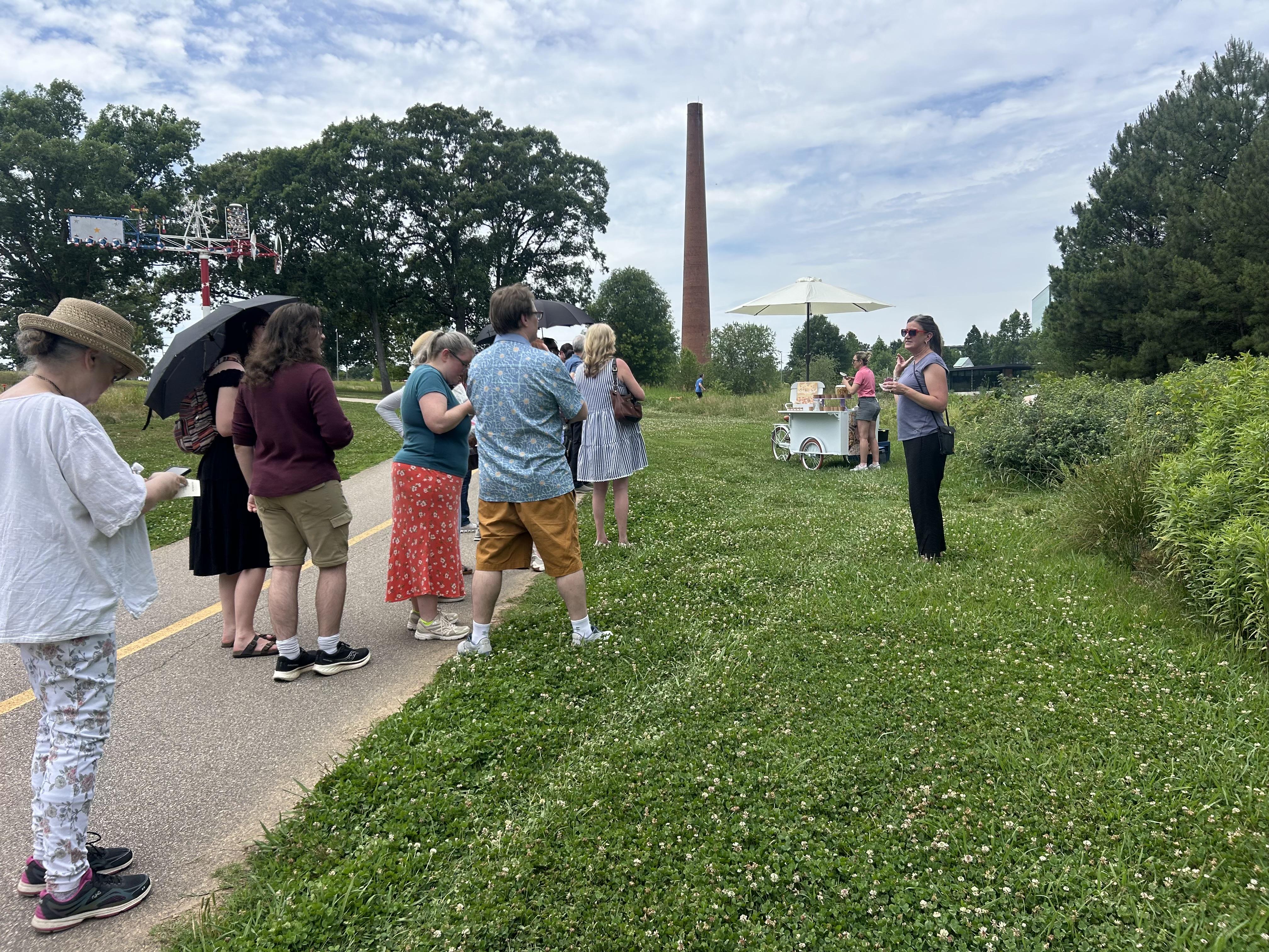 The park director gives a tour accompanied by small bites at various locations